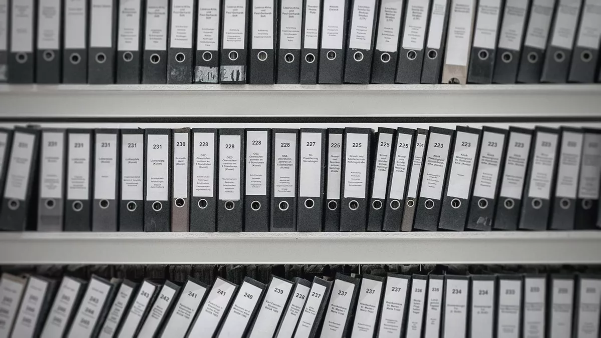 Shelves full of ring binders